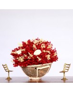 Handcrafted Red Flower Arrangement on Coconut Shell