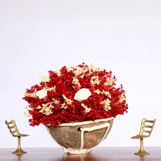 Handcrafted Red Flower Arrangement on Coconut Shell