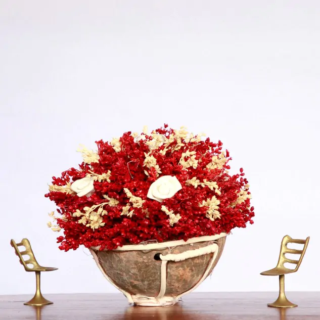 Flower arrangement on Coconut